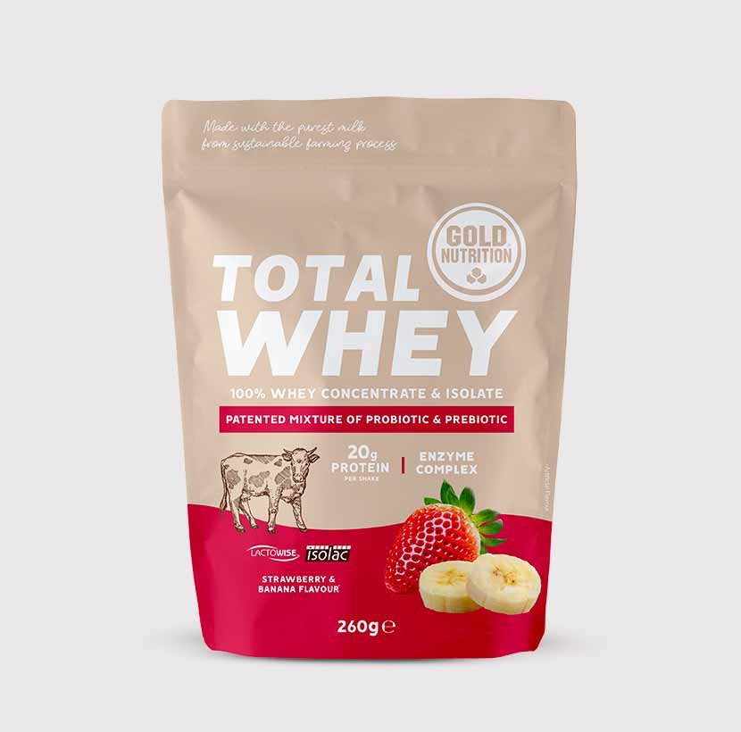 GoldNutrition Total Whey vanilla protein powder in a 260g container with a label and scoop for muscle recovery and nutrition.