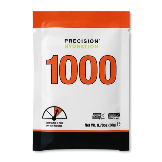 Precision Fuel & Hydration electrolyte and carbohydrate drink mix in a resealable pouch with a scoop, ready for mixing.