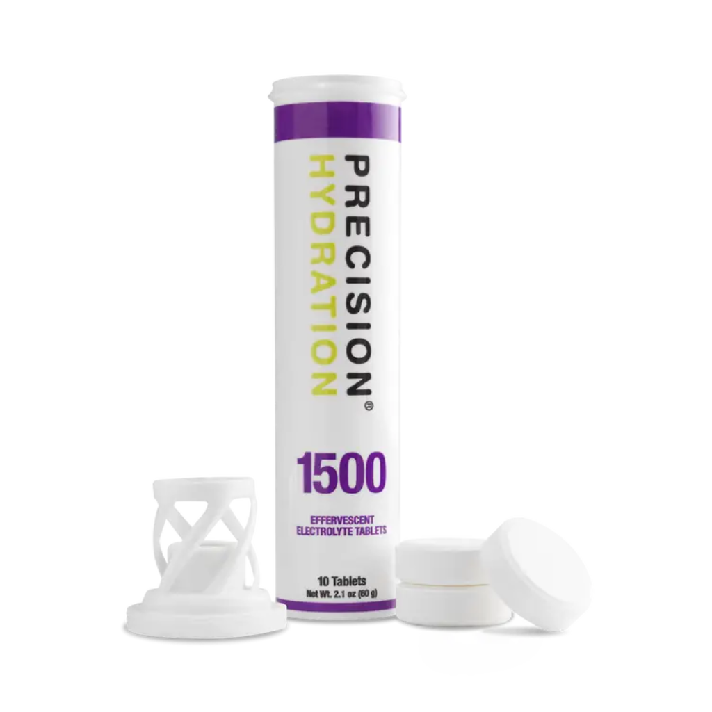 Precision Fuel & Hydration electrolyte drink tablets in a clear container, showing colorful tablets designed for hydration.